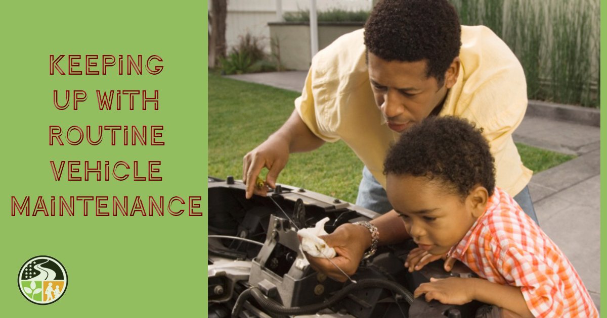 A man and his son maintaining their vehicle